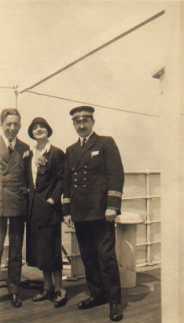 Carlotta & Ralph Barton on deck of the "Paris" with captain