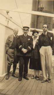 Carlotta Barton on the deck of the "Paris" with captain and others